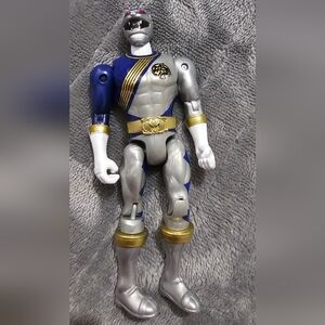 Action Figure with Blue and Gold Accents